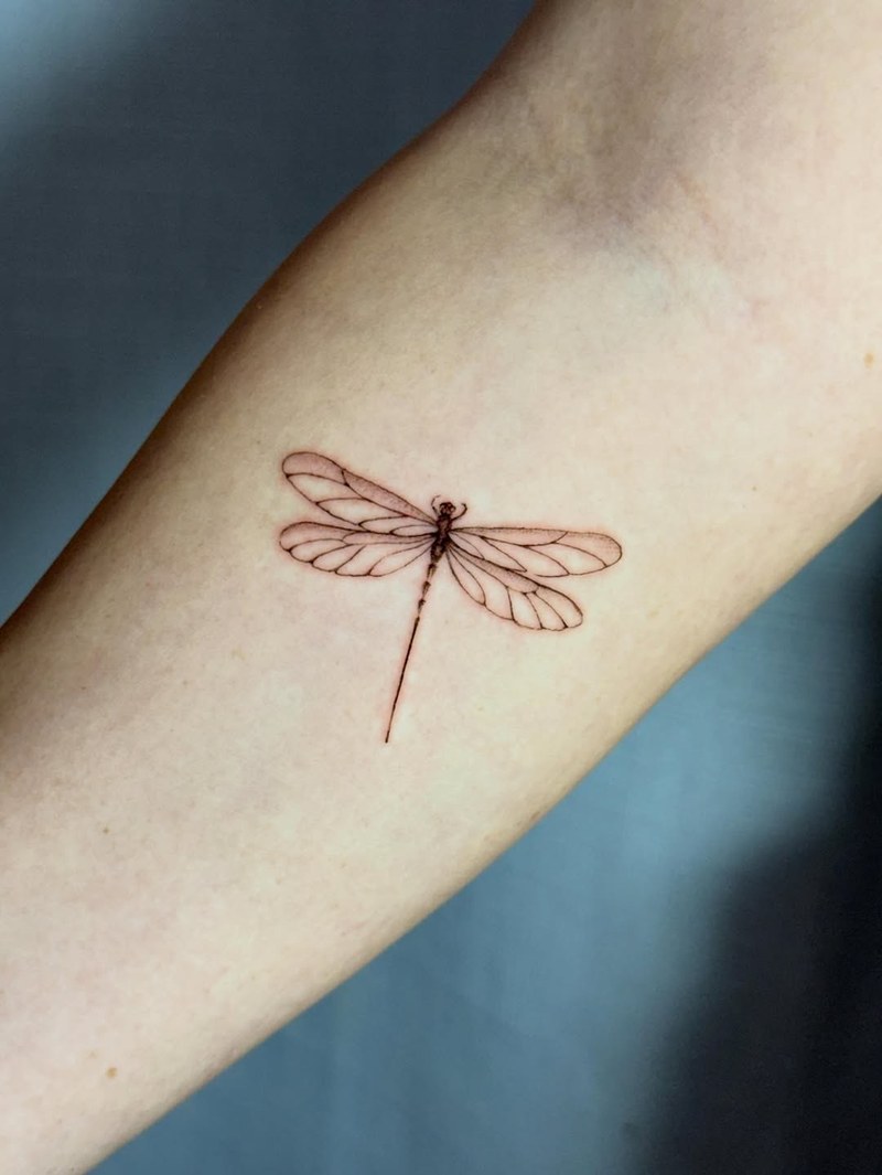 Close-up of a tattoo session